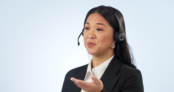 Asian Woman Face Talking Call Center Headphones Studio Blue Background — Stock Video