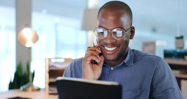 Businessman, black man and tablet with thinking, networking and planning in modern office with glasses. Face, african person and touchscreen for reading, technology and digital marketing at workplace.