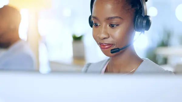 Call center, computer and black woman in telemarketing, support or contact us at help desk in office. Customer service, sales agent and African consultant in communication, online advice and business.