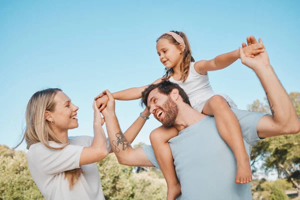 Nature, shoulder carry and happy family kid, mother and father enjoy time together, natural park or fun plane game. Freedom, support and walking mom, child and papa bonding, playing or piggyback girl.