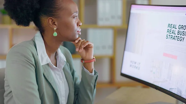 Business, computer screen and black woman in office, thinking and planning with ideas, career and project development. African person, employee or consultant with a strategy or pc in a workplace.