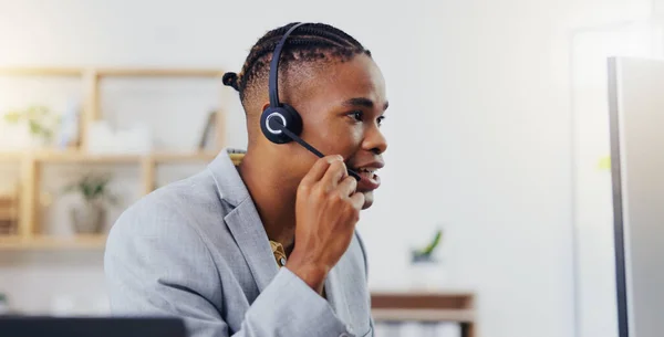 Customer service, laptop video call and happy black man networking on webinar, online conference or telemarketing. Communication microphone, callcenter consulting and office person on sales pitch.