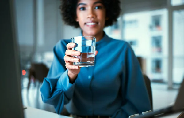 Woman, glass and water in portrait, office and smile for hydration, wellness and pride at finance company. Accountant, natural drink and happy for nutrition, diet or detox for health in workplace.