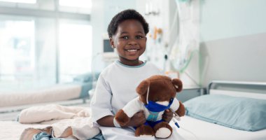 Healthcare, black child and teddy bear in hospital for surgery recovery, patient and healthy results. Face, boy kid and bed for medical, wellness or toy for relax on bed, rehabilitation and happiness. clipart