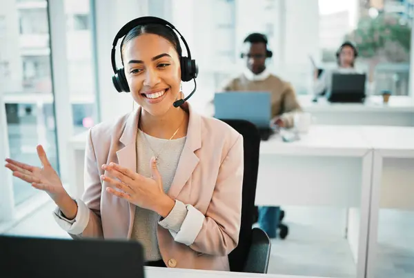 Happy woman, laptop and call center with headphones consulting in customer service or telemarketing at office. Female person, consultant or agent smile for online advice or contact us at workplace.