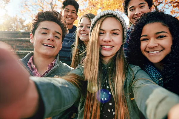 Selfie, happiness or portrait of friends in park for social media, online post or profile picture together. Boy, diversity or gen z girls with smile for photo for a fun holiday vacation to relax.