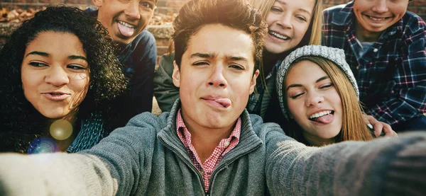 Teenage, friends or group selfie in autumn or social media joy, diversity or outdoor community bonding. Girls, male person or portrait fun face memory in park joy picture, clothes or profile picture.