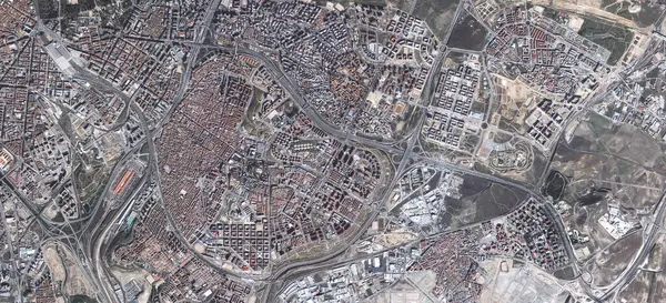 Aerial, state map and satellite view of landscape, nature and city outdoor with town pattern. Land, urban and above with houses, neighborhood and roads with commercial development from top terrain.