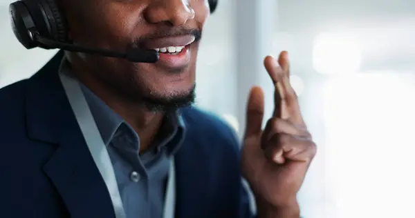 Man, mouth and consulting in call center, customer service or telemarketing at office. Closeup of male person, consultant or agent lips talking on headphones for online advice, help or contact us.
