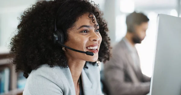 Happy woman, call center and face with headphones in customer service, support or telemarketing at office. Friendly person, consultant or agent smile in online advice, help or contact us at workplace.