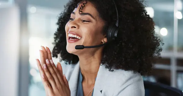 Computer, call center and funny woman in customer service, tech support and talk to contact at help desk. Communication, telemarketing and African sales agent laughing, consulting and crm advisory.