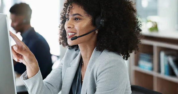 Happy woman, call center and headphones in customer service, telemarketing or support at office. Friendly female person, consultant or agent smile for online advice, help or contact us at workplace.