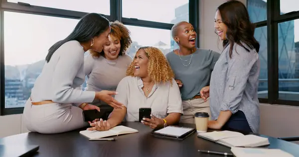 Teamwork, happy or business women with phone for gossip news, social media or blog content reading In office. Friends, startup or group of employee on smartphone smile for networking or communication.
