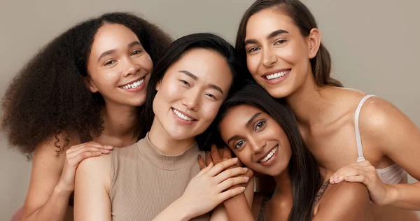 Women, portrait and beauty, diversity and happy with wellness, dermatology and friends isolated on studio background. Unique skin, natural cosmetics and inclusion with skincare, smile and antiaging.