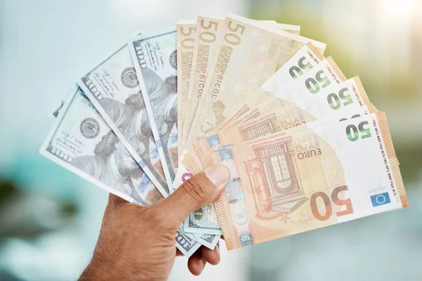 Cash in hand and dollars or euros from winning lottery, prize or bonus with interest, profit or investment of savings in bank. Finance, winner and money notes or lotto, award from cashback and credit.