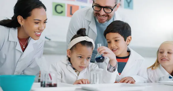 Science, school and students in class with their teachers for learning or to study chemistry. Children, education and scholarship with kids in a laboratory for an experiment of chemical reaction.