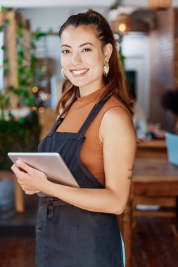 Restaurant, tablet and portrait of woman or small business owner, e commerce and cafe or coffee shop management. Happy waitress or young person with sales, profit and digital technology for startup. clipart