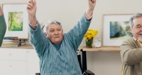 Senior Friends Home Watching Celebration Happy Fist Air Man Women — Stock Video