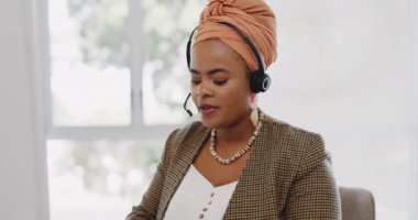 Face, customer service and black woman at call center consulting in office. Telemarketing, customer support or female sales agent, consultant and employee in communication, talking or speaking on mic.