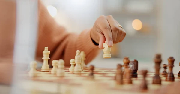 Closeup, chess and hands with person, game and expert with strategy, skills and winner. Player, competition and contest with professional, activity and hobby with tournament, knowledge and challenge.