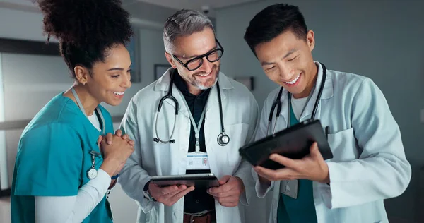 Doctors, nurses and tablet with healthcare success, applause and celebration of hospital results or solution. Happy medical team, mentor and students on digital technology for hospital news or goals.