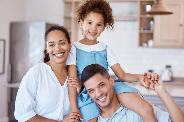 stock image Were giving her lots of fun memories to cherish. Portrait of a little girl bonding with her parents at home