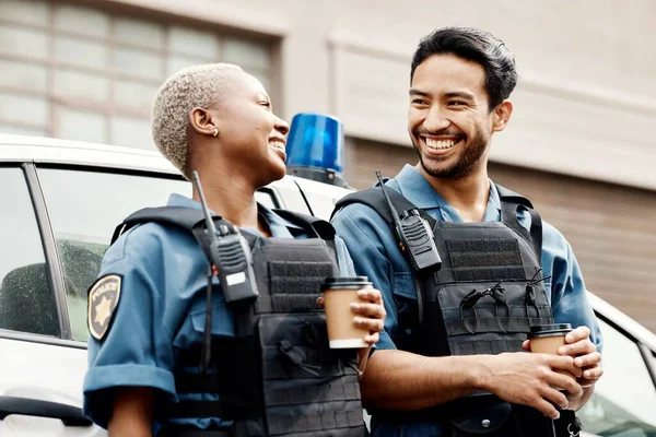 Car, coffee or police partner in city for protection, law enforcement or crime on a break together. Lunch, funny policeman or happy woman security guard laughing or standing for justice or teamwork.