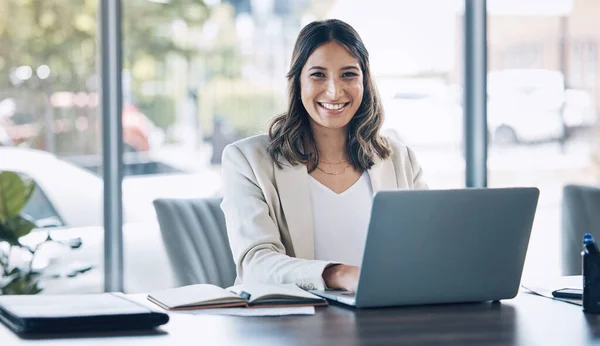 Lawyer, portrait and laptop in office planning, legal consulting or policy review feedback in corporate law firm. Smile, happy and attorney woman on technology in case research or schedule management.