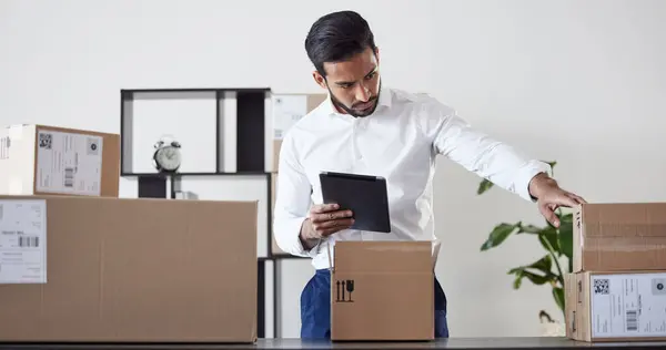 Tablet, box and business man for ecommerce for logistics, delivery startup and distribution service. Shipping, supply chain and male person on digital tech planning for package, parcel and cargo.
