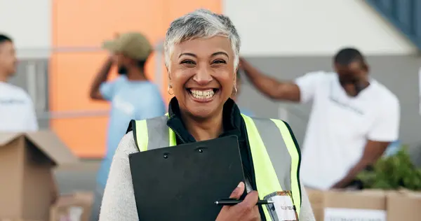 stock image Woman, clipboard and donation for charity, volunteer and organizer for outreach program, smile and portrait. Happy senior person, non profit and support in social responsibility for NGO foundation.