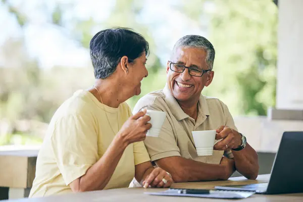Coffee, love and laptop with old couple and planning for finance, payment and online shopping. Happy, deal and website with senior man and woman browsing at home for search, technology and morning.