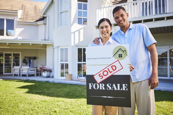 New house, sold sign or happy couple portrait with dream home choice, real estate and property purchase, sale or opportunity. Mortgage, homeowner smile or outdoor people with relocation success board.