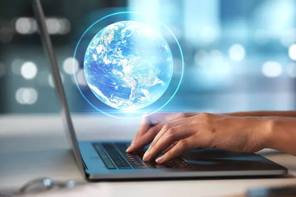 Laptop, hands and Earth hologram with future technology and globe with coding and digital overlay with person typing. Futuristic, tech innovation and 3D with global network, cyber space and big data.