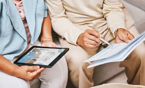 Finance documents, tablet and senior couple with paperwork for mortgage, payment and savings. Insurance, retirement home application and hands with digital tech for contract, investment and pension.