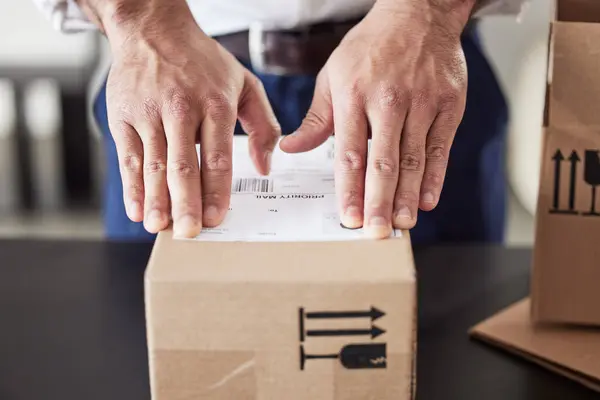 Label, delivery or hands of man with box for courier cargo, ecommerce or supply chain distribution service. Shipping, order sticker or postman sending a store package, freight parcel or mail product.