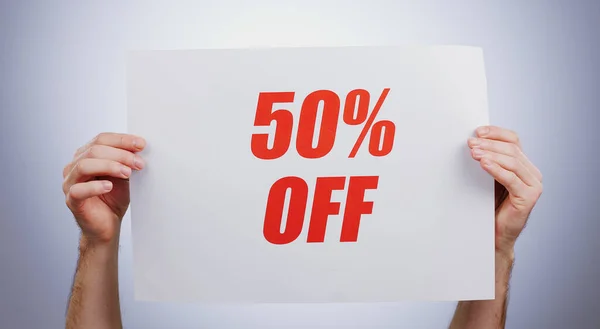 Hands, discount 50 percentage and advertising sign at studio isolated on a white background. Poster, sales deal and special offer of price reduction, half price 50 clearance promotion and marketing s.