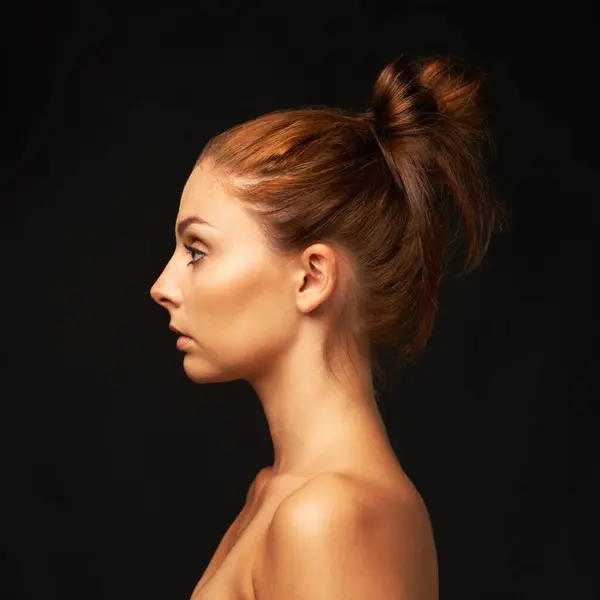 Hair care, profile or model with beauty space, skincare or results for glow, shine or collagen in studio. Black background, salon or natural woman with mockup for treatment, healthy texture or growth.