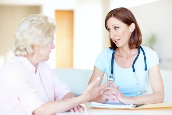 What is the best course of action, doctor - Senior Health. An elderly woman expresses her concerns to a trusted doctor