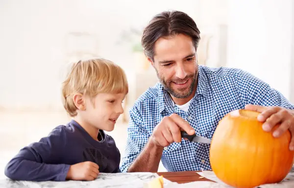 Final Touch Father Son Carving Pumpkin Home Halloween — Stock Photo, Image