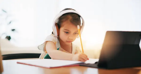 Girl Headphones Writing Book Elearning Education Study Desk Home Female — Stock Photo, Image