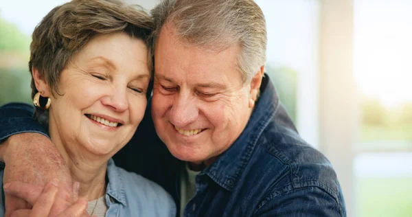 Love, face and mature happy couple hug, affection and retirement smile from wife, husband or marriage partner. Romance, home happiness and relax old man, woman or people embrace for relationship care.