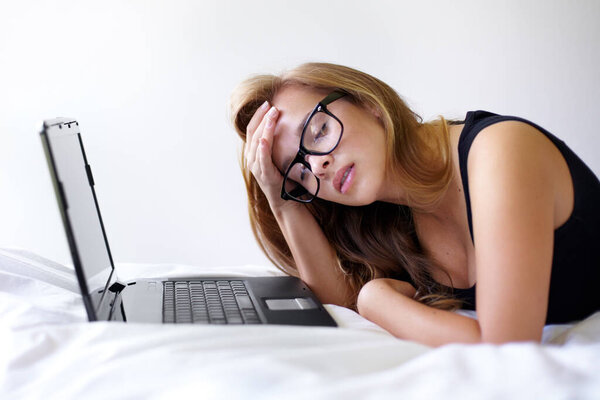 Student woman, laptop and mistake on bed with stress for exam, assessment or test with online course. Girl, studying and education with computer in bedroom for elearning, 404 glitch and error in home.