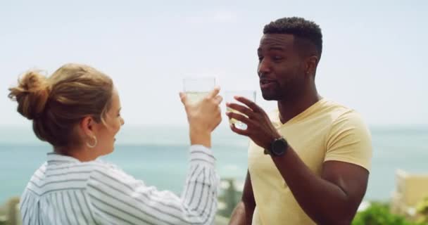 Cheers Drinks Happy Couple Holiday Ocean Resort Hotel Celebration Interracial — Stock Video
