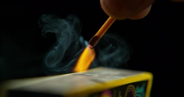 Match Ignite Hand Orange Flame Smoke Smoking Studio Dark Background — Stock Video