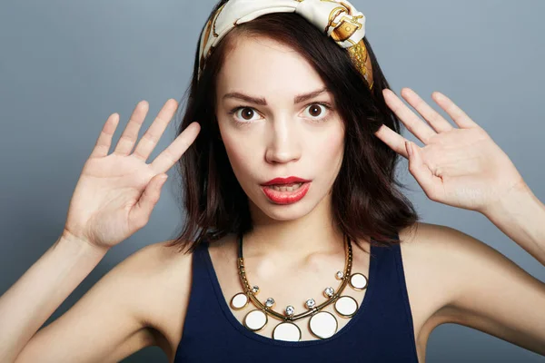 Portrait, surprise and woman with wow, gossip and announcement on a grey studio background. Face, person and model with facial expression, shocked and news with deal, opportunity and omg with emoji.