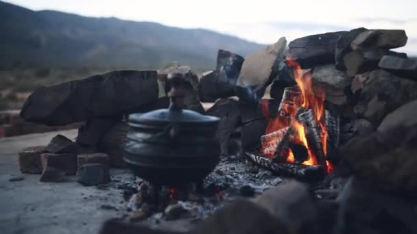 Rocks Outdoor Cooking Pot Fire Charcoal Ground Dusk Nature Countryside — Stock Video