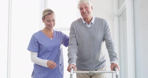 Elderly Man Walking Frame Nurse Hospital Leg Support Rehabilitation Help — Stock Video