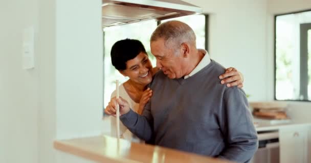 Laughing Hug Senior Couple Cooking Talking Bonding Home Kitchen Happy — Stock Video