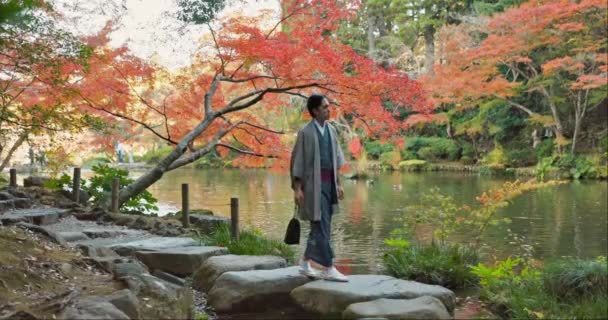 Asian Man Walking Garden Japan Nature Mindfulness Outdoor Lake Pond — Stock Video