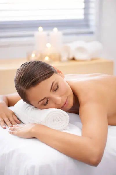 Woman, spa and massage for wellness and self care, aromatherapy or alternative medicine with peace and calm. Relax, luxury and zen with holistic healing, bodycare for stress relief and wellbeing.
